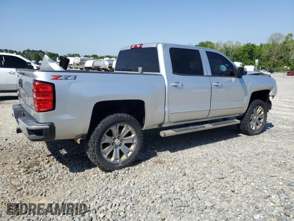 2018 Chevrolet Silverado 1500 LT with VIN 3GCUKREC6JG167804, listed as a Copart auction lot 52859235 with 124,822 mi miles and Salvage Title. Bid and sale history available at DreamBid. Image 3.