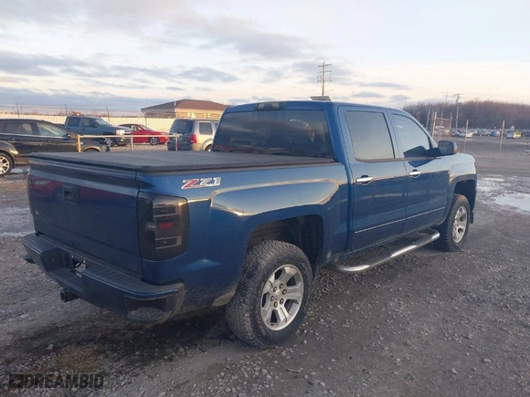 2016 Chevrolet Silverado 1500 LT with VIN 3GCUKREC8GG170387, listed as a IAAI auction lot 40974467 with 138,706 mi miles. Bid and sale history available at carsss.com. Image 4.