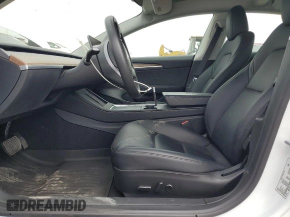 2023 Tesla Model 3 с VIN 5YJ3E1EA7PF552774, выставлен на аукционе Copart как лот 59913565 с пробегом 25 406 миль миль и Списание • Salvage title. История ставок и продаж доступна на DreamBid. Изображение 7.
