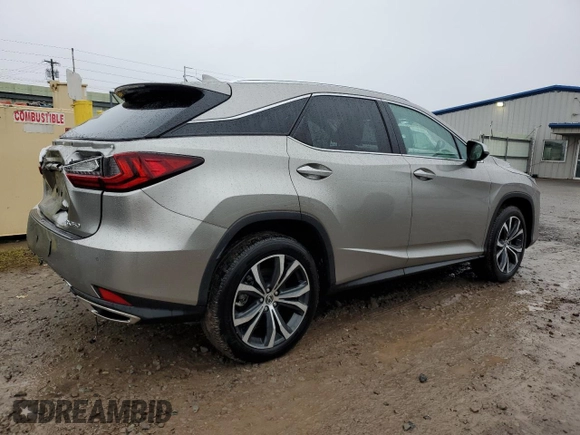 2022 Lexus RX with VIN 2T2HZMDA4NC321485, listed as a Copart auction lot 70409922 with 8,963 mi miles. Bid and sale history available at carsss.com. Image 3.