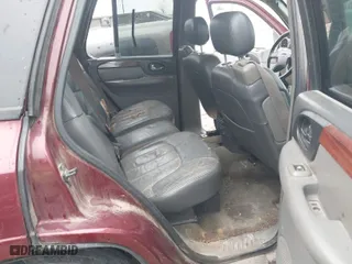 2003 GMC Envoy SLT with VIN 1GKDS13S532314397, listed as a IAAI auction lot 41184274 with 232,750 mi miles. Bid and sale history available at carsss.com. Image 8.