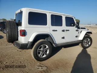 2020 Jeep Wrangler Unlimited Sahara Altitude with VIN 1C4HJXEG4LW314038, listed as a Copart auction lot 73728374 with 50,828 mi miles and Salvage title. Bid and sale history available at DreamBid. Image 3.