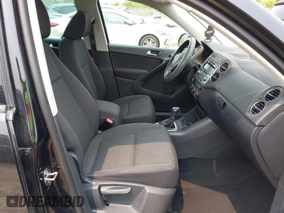 2013 Volkswagen Tiguan S with VIN WVGAV3AX2DW594334, listed as a IAAI auction lot 42405989 with 96,559 mi miles and . Bid and sale history available at DreamBid. Image 5.