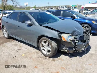2009 Pontiac G6 1SB z VIN 1G2ZJ57K594262745, wystawiony jako IAAI lot #41997931 z przebiegiem 194 570 mil mil oraz . Historia ofert i sprzedaży dostępna na DreamBid. Obrazek 1.