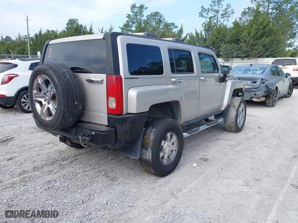 2006 Hummer H3 with VIN 5GTDN136068312962, listed as a IAAI auction lot 42087899 with 298,681 mi miles. Bid and sale history available at carsss.com. Image 4.