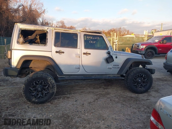 2018 Jeep Wrangler JK Unlimited Sport S with VIN 1C4BJWDG5JL862100, listed as a IAAI auction lot 40986228 with 1 mi miles. Bid and sale history available at carsss.com. Image 14.
