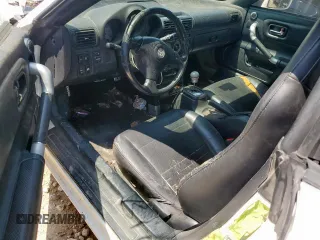 2003 Toyota MR2 z VIN JTDFR320030064073, wystawiony jako Copart lot #57773335 z przebiegiem 211 863 mil mil oraz Tytuł czysty. Historia ofert i sprzedaży dostępna na DreamBid. Obrazek 8.