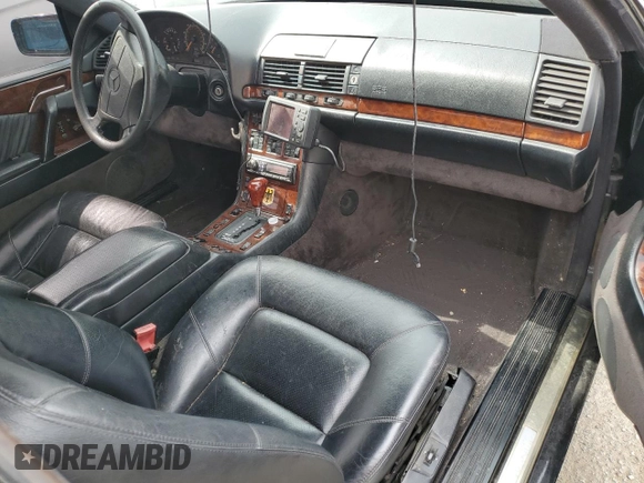 1995 Mercedes-Benz S with VIN WDBGA70E0SA272091, listed as a Copart auction lot 57371104 with Not Provided miles and Salvage Title. Bid and sale history available at DreamBid. Image 8.