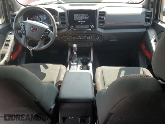 2022 Nissan Frontier Pro-4X with VIN 1N6ED1EK1NN601886, listed as a Copart auction lot 65182295 with 51,879 mi miles and Salvage title. Bid and sale history available at DreamBid. Image 8.