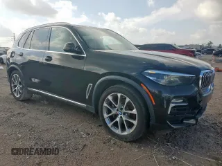 2019 BMW X5 xDrive40i with VIN 5UXCR6C54KLL35873, listed as a Copart auction lot 64989745 with 129,538 mi miles and Salvage title. Bid and sale history available at DreamBid. Image 4.