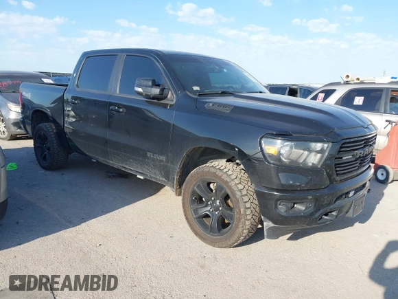 2021 Ram 1500 Big Horn with VIN 1C6SRFFT1MN520081, listed as a IAAI auction lot 42187257 with 186,011 mi miles and . Bid and sale history available at DreamBid. Image 1.