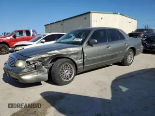 2002 Ford Crown Victoria Standard с VIN 2FAFP73WX2X103936, выставлен на аукционе Copart как лот 67688374 с пробегом 161 511 миль миль и Списание • Salvage title. История ставок и продаж доступна на DreamBid. Изображение 1.