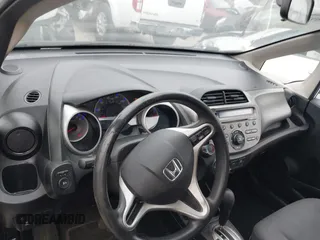 2013 Honda Fit with VIN JHMGE8H30DC067178, listed as a IAAI auction lot 41498926 with 121,036 mi miles. Bid and sale history available at carsss.com. Image 11.