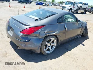 2004 Nissan 350Z Touring z VIN JN1AZ34E94M155097, wystawiony jako IAAI lot #42273474 z przebiegiem Nie podano mil oraz . Historia ofert i sprzedaży dostępna na DreamBid. Obrazek 4.