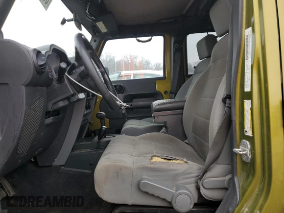 2007 Jeep Wrangler Unlimited Rubicon с VIN 1J4GA691X7L145737, выставлен на аукционе Copart как лот 86277914 с пробегом 285 624 миль миль и Списание • Salvage title. История ставок и продаж доступна на DreamBid. Изображение 7.