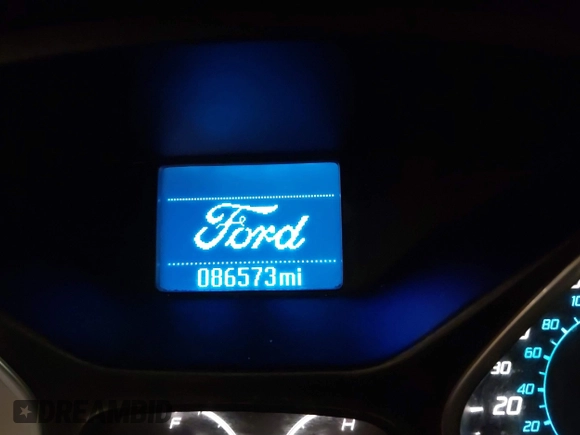 2012 Ford Focus SE with VIN 1FAHP3F24CL217049, listed as a IAAI auction lot 41825450 with 86,573 mi miles. Bid and sale history available at carsss.com. Image 7.