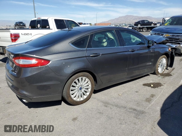2016 Ford Fusion SE Hybrid with VIN 3FA6P0LU3GR307666, listed as a Copart auction lot 57444365 with 127,786 mi miles and Salvage title. Bid and sale history available at DreamBid. Image 3.