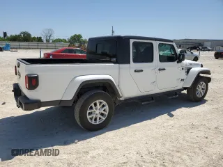 2023 Jeep Gladiator Freedom with VIN 1C6HJTAG1PL585720, listed as a Copart auction lot 47386855 with 14,525 mi miles and Salvage title. Bid and sale history available at DreamBid. Image 3.