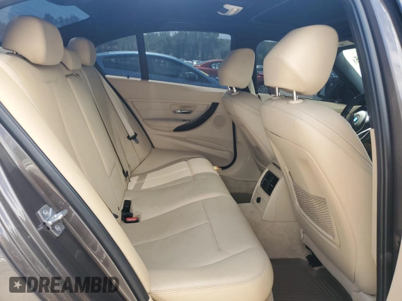 2014 BMW 3 Series 320i xDrive with VIN WBA3C3C53EK200375, listed as a Copart auction lot 59915595 with 104,320 mi miles and Salvage title. Bid and sale history available at DreamBid. Image 10.