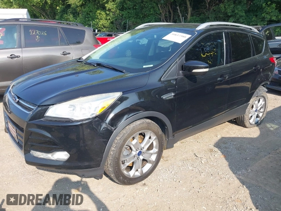 2014 Ford Escape Titanium with VIN 1FMCU9J93EUD60149, listed as a IAAI auction lot 39837388 with 154,880 mi miles. Bid and sale history available at carsss.com. Image 2.