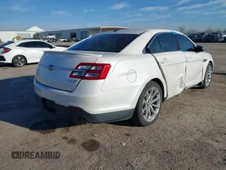 2015 Ford Taurus Limited с VIN 1FAHP2F85FG169704, выставлен на аукционе IAAI как лот 41152599 с пробегом 167 589 миль миль и . История ставок и продаж доступна на DreamBid. Изображение 4.