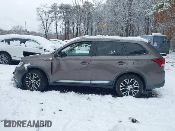2017 Mitsubishi Outlander ES z VIN JA4AZ2A36HZ015375, wystawiony jako IAAI lot #41520168 z przebiegiem 59 584 mil mil oraz . Historia ofert i sprzedaży dostępna na DreamBid. Obrazek 14.