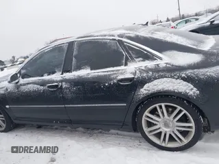 2007 Audi S8 z VIN WAUPN44E67N009650, wystawiony jako IAAI lot #41341680 z przebiegiem 166 611 mil mil oraz . Historia ofert i sprzedaży dostępna na DreamBid. Obrazek 14.