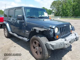 2007 Jeep Wrangler Unlimited Sahara z VIN 1J4GA59117L216687, wystawiony jako IAAI lot #42188257 z przebiegiem 176 507 mil mil oraz . Historia ofert i sprzedaży dostępna na DreamBid. Obrazek 1.