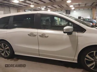 2021 Honda Odyssey Touring with VIN 5FNRL6H80MB026908, listed as a IAAI auction lot 41564765 with 116,453 mi miles. Bid and sale history available at carsss.com. Image 13.