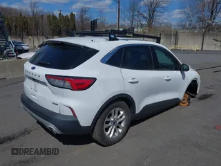 2020 Ford Escape SE with VIN 1FMCU9G61LUB80243, listed as a IAAI auction lot 41842611 with 76,801 mi miles. Bid and sale history available at carsss.com. Image 4.