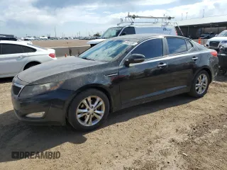 2013 Kia Optima EX with VIN 5XXGN4A7XDG106866, listed as a Copart auction lot 60629395 with 119,720 mi miles and Salvage title. Bid and sale history available at DreamBid. Image 1.