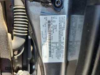 2018 Ford Focus SE with VIN 1FADP3F25JL331038, listed as a Copart auction lot 60235395 with 37,038 mi miles and Salvage title. Bid and sale history available at DreamBid. Image 12.