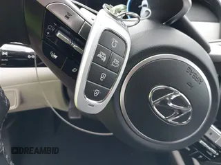 2022 Hyundai Tucson SEL with VIN 5NMJF3AE2NH115088, listed as a IAAI auction lot 41915800 with 13,120 mi miles and . Bid and sale history available at DreamBid. Image 11.