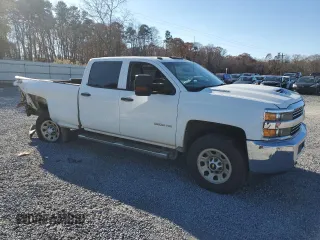 2017 Chevrolet Silverado 3500HD Work Truck with VIN 1GC4KYCY7HF141670, listed as a Copart auction lot 82286874 with 202,697 mi miles and Salvage Title. Bid and sale history available at DreamBid. Image 4.