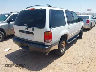 1999 Ford Explorer XLT with VIN 1FMZU34EXXUB24892, listed as a IAAI auction lot 42360239 with 497,613 mi miles and . Bid and sale history available at DreamBid. Image 4.