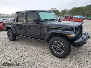 2021 Jeep Gladiator Sport S with VIN 1C6JJTAG7ML590031, listed as a Copart auction lot 43600245 with 56,955 mi miles and Salvage Title. Bid and sale history available at carsss.com. Image 4.