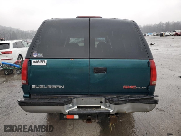 1995 GMC Suburban z VIN 1GKFK16K0SJ748087, wystawiony jako Copart lot #85121834 z przebiegiem 191 550 mil mil oraz Szkoda całkowita • Salvage title. Historia ofert i sprzedaży dostępna na DreamBid. Obrazek 6.