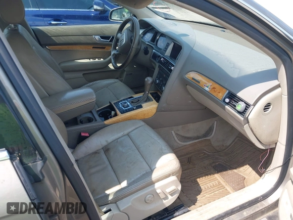 2007 Audi A6 z VIN WAUDV74F77N054612, wystawiony jako IAAI lot #42399517 z przebiegiem 137 577 mil mil oraz . Historia ofert i sprzedaży dostępna na DreamBid. Obrazek 5.