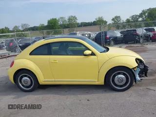 2013 Volkswagen Beetle with VIN 3VWHX7AT0DM603661, listed as a IAAI auction lot 42464030 with 95,159 mi miles and . Bid and sale history available at DreamBid. Image 14.