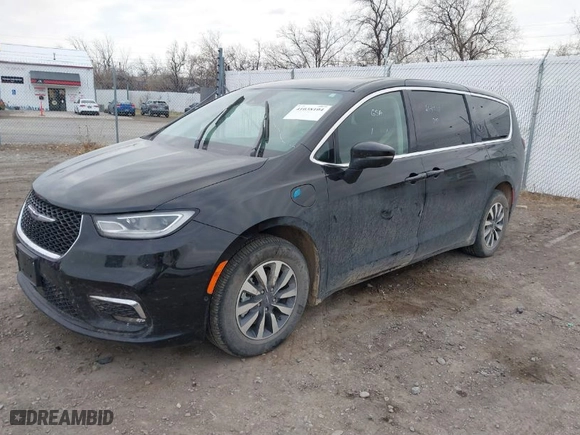 2023 Chrysler Pacifica Hybrid Touring L with VIN 2C4RC1L7XPR518209, listed as a IAAI auction lot 41038104 with 35,969 mi miles. Bid and sale history available at carsss.com. Image 2.