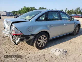 2008 Ford Taurus SEL with VIN 1FAHP24W68G187312, listed as a Copart auction lot 62879765 with 154,706 mi miles and Salvage title. Bid and sale history available at DreamBid. Image 3.