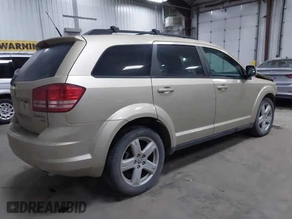 2010 Dodge Journey SXT with VIN 3D4PH5FVXAT180831, listed as a IAAI auction lot 41506328 with 155,482 mi miles. Bid and sale history available at carsss.com. Image 4.