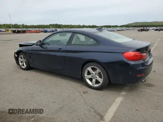 2014 BMW 4 Series 428i xDrive with VIN WBA3N5C58EK196233, listed as a Copart auction lot 58775715 with 131,340 mi miles and Salvage title. Bid and sale history available at DreamBid. Image 2.