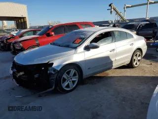 2014 Volkswagen CC Sport z VIN WVWBP7AN2EE505913, wystawiony jako Copart lot #42380915 z przebiegiem 98 976 mil mil oraz Szkoda całkowita • Salvage title. Historia ofert i sprzedaży dostępna na DreamBid. Obrazek 1.
