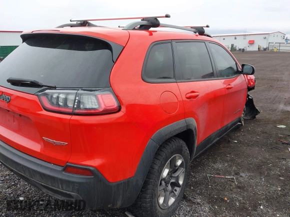 2019 Jeep Cherokee Trailhawk with VIN 1C4PJMBX4KD337408, listed as a IAAI auction lot 41788054 with 42,365 mi miles and . Bid and sale history available at DreamBid. Image 4.