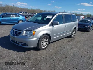 2016 Chrysler Town & Country Touring with VIN 2C4RC1BG5GR175293, listed as a IAAI auction lot 41985609 with 154,638 mi miles. Bid and sale history available at carsss.com. Image 17.