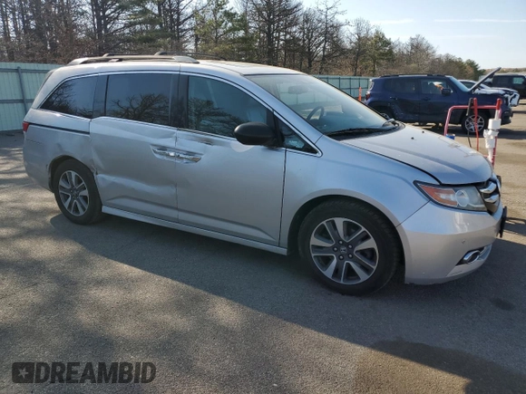 2014 Honda Odyssey Touring with VIN 5FNRL5H94EB094357, listed as a Copart auction lot 53930635 with 210,448 mi miles and Salvage Title. Bid and sale history available at carsss.com. Image 4.