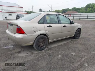 2007 Ford Focus S with VIN 1FAHP34N27W231422, listed as a IAAI auction lot 42521488 with 113,296 mi miles and . Bid and sale history available at DreamBid. Image 4.