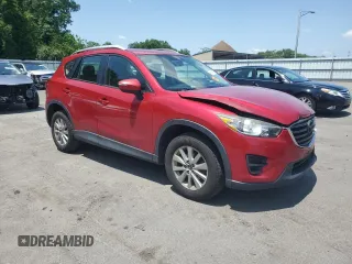2016 Mazda CX-5 Sport with VIN JM3KE4BY3G0765905, listed as a Copart auction lot 61874165 with 134,546 mi miles and Salvage title. Bid and sale history available at DreamBid. Image 4.