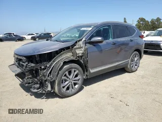 2020 Honda CR-V Touring z VIN 7FART6H91LE022880, wystawiony jako Copart lot #55529035 z przebiegiem 41 238 mil mil oraz Szkoda całkowita • Salvage title. Historia ofert i sprzedaży dostępna na DreamBid. Obrazek 1.